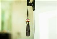 Load image into Gallery viewer, Beaded Leather Tassel